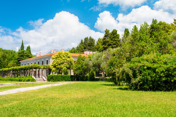 Fototapeta na wymiar Panoramic summer landscape of the former summer residence Villa Milocer