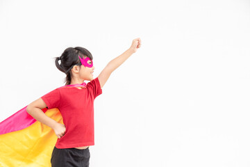 Funny little girl playing power superhero over white background. superhero concept.