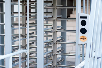 A turnstile at the stadium for spectators to pass by passes.