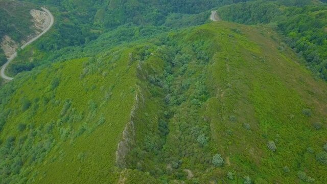 aerial view of the old Roman gold mine "a toca" on the green mountains of Caurel