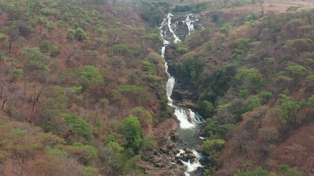 Flying over a waterfall in Bi&eacute; , Angola on the African continent 3