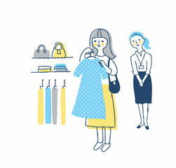 洋服を選んでいる若い女性
