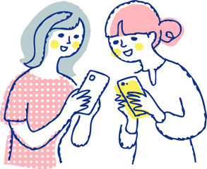 スマホの画面を見せ合う女性二人