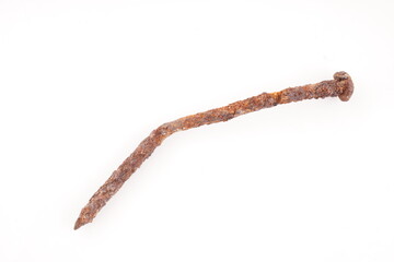 old rusty nail on white background