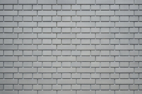 Fototapeta Luxury gray brick wall texture background. Close up of stylish brick wall.