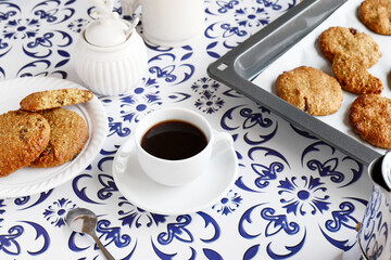 Morning coffee with dietetic crunchy gluten free biscuits on the table. Healthy eating. Vegan banana cookies.