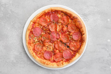 Top view of small size pizza pepperoni
