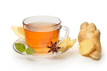 Ginger tea with lemon and mint in glass cup isolated on white background.