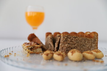 Assortment of baked sweet treats, including chocolate rum balls,