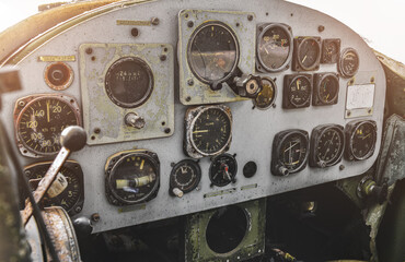 Damaged old war military helicopter control panel.