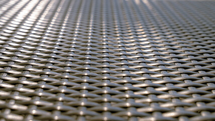Close up view of grey net surface. For background texture. Selective focus. Copy space.