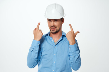 man in blue shirt white construction helmet protection professional engineer