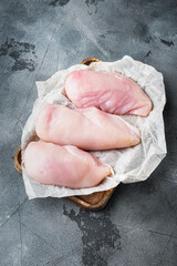 Chicken uncooked meat on grey background