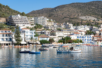 Fototapeta na wymiar July, 20, 2021. Hydra Island, Greece. View of the bay, ships and attractions of the island of Hydra