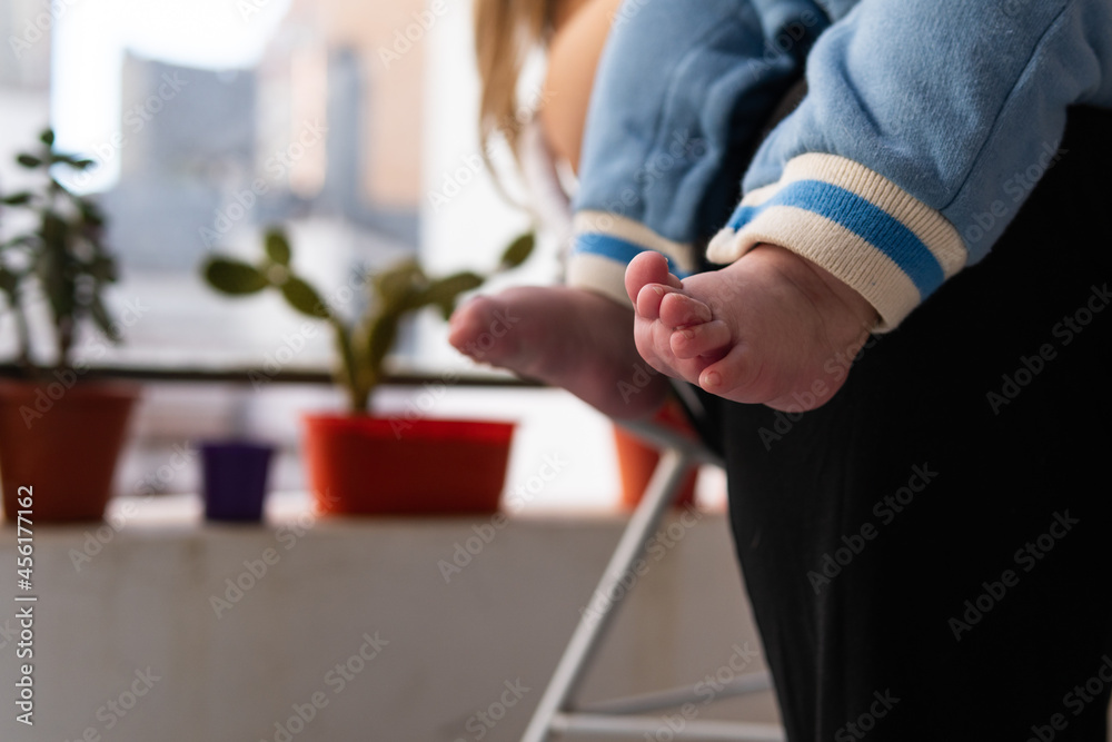 Canvas Prints Closeup shot of feet of a cute chil