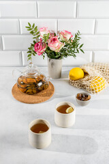 transparent tea pot on a light background