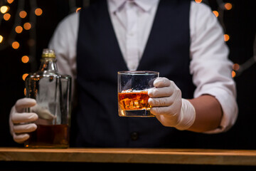 Bartender Serve Whiskey, on wood bar, 
