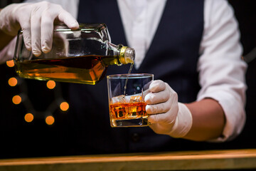 Bartender Serve Whiskey, on wood bar, 