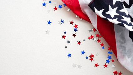 Obraz premium US flag and confetti stars on white background. USA Independence Day, American Labor day, Memorial Day, Columbus day banner design.
