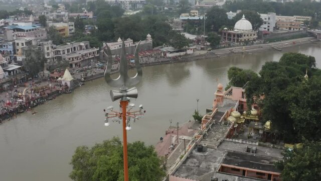 Zooming-in to River Shipra near Mahakal Temple. Banks of pious river Shipra near Lord Shiva&rsquo;s Mahadev Temple in Ujjain. Wide-angle to medium angle shot.