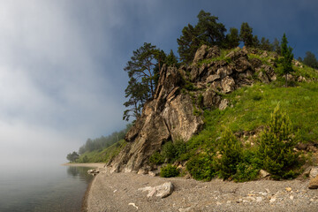 Fototapeta na wymiar Sandy beach on the shore of Lake Baikal