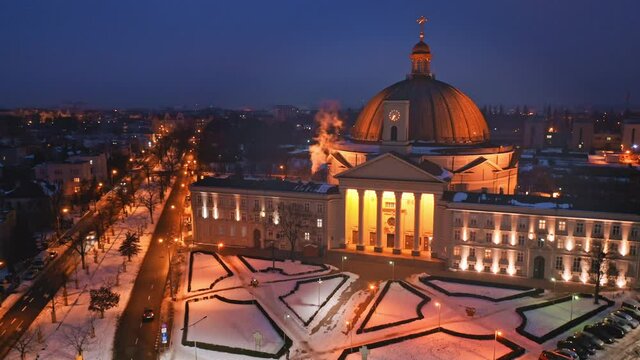 Basilica in Bydgoszcz in winter at night. Architecture in Poland.