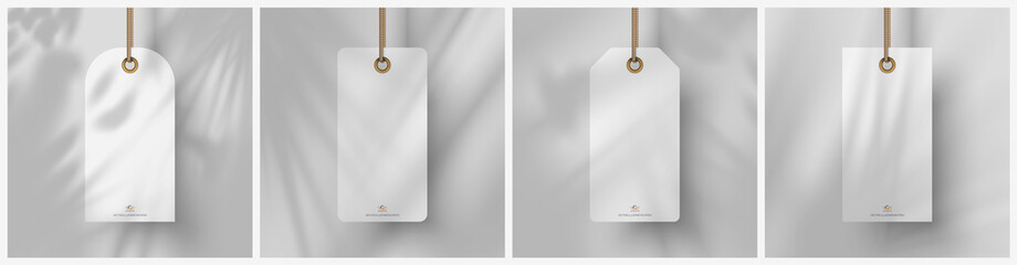 Realistic tags mockup: four blank white tags with overlay tropical shadow. Vector illustration Ai10, EPS10