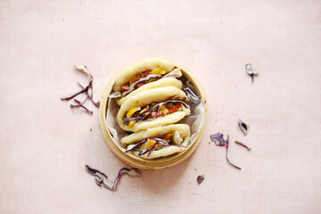 Bao bun in bamboo steamer 