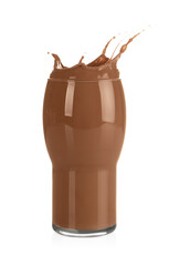 Tasty chocolate milk splashing out of glass isolated on white