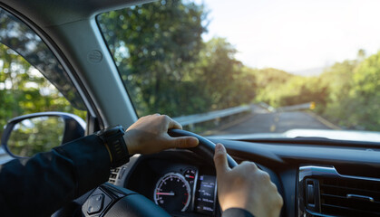 people driving car on mountain road