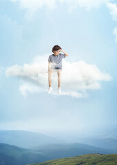 Creative collage with little preschool boy sitting on white cloud and flying at sky, outdoors....