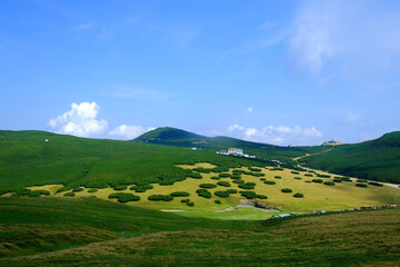 Fototapeta premium Beautiful landscape on the Bucegi Plateau, with Jepii Mari and Piatra Arsa Chalet, Carpathian Mountains, Romania