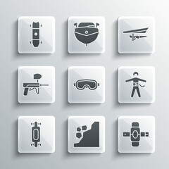 Set Landslide, Knee pads, Bungee jumping, Ski goggles, Longboard or skateboard, Paintball gun, and Hang glider icon. Vector