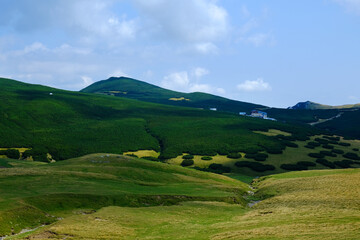 Obraz premium Beautiful landscape on the Bucegi Plateau, with Jepii Mari and Piatra Arsa Chalet, Carpathian Mountains, Romania