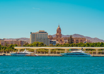 Sea view and seafront promenade port of Malaga in summer