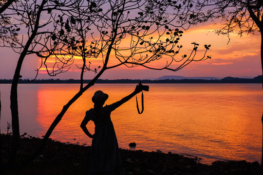 tropical beach seaside on sunset time at Laem Hua Mong - Kho Kwang Viewpoint in Chomphon province Thailand with silhouette girl photography 