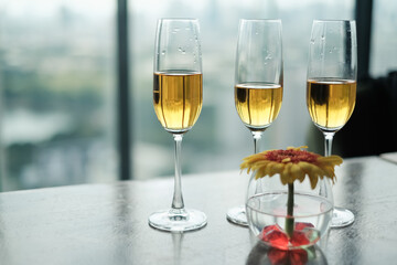 closeup a glass of champagne on table