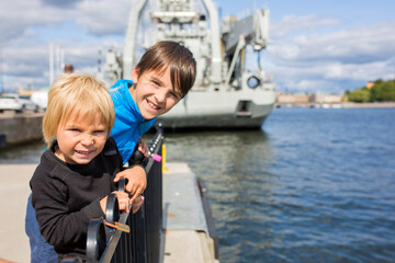 Fototapeta na wymiar Young preschool child, visiting city of Stockholm with his family, sweden