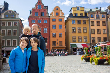 Young preschool child, visiting city of Stockholm with his family, sweden