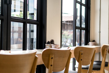 Range of wooden chair for relaxation at cafe, minimal interior style  