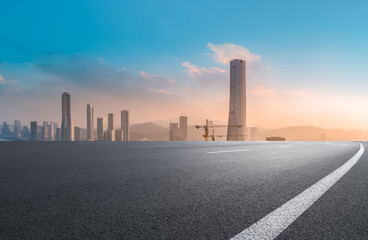 Road and city buildings background