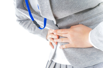 腹痛で苦しむ若いキャリアウーマン