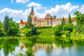 Obraz premium Pruhonice castle and natural park landscape with garden lake on sunny summer day, Pruhenice, Czech Republic. UNESCO World Heritage Site