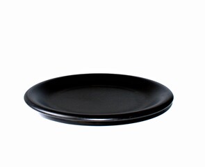 black ceramic plate on a white background