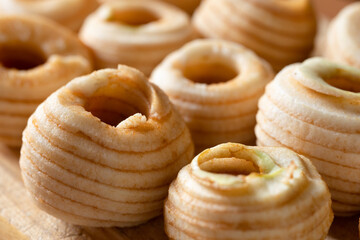 Apples peeled with an apple peeler device close up