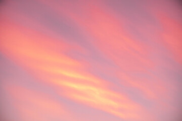 Obraz premium beautiful orange clouds and sunlight on the blue sky perfect for the background, take in everning,Twilight