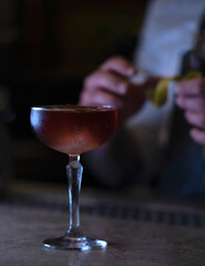 Delicious elegant orange cocktail in top bar restaurant in bogota colombia
