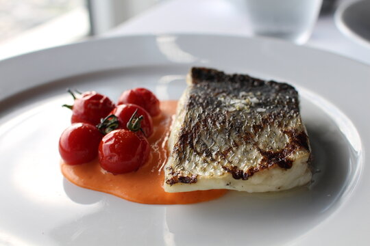 Fish with tomatoes