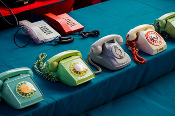 Old telephones of many colors, vintage, retro.