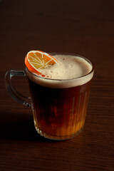 iced orange coffee on wooden table